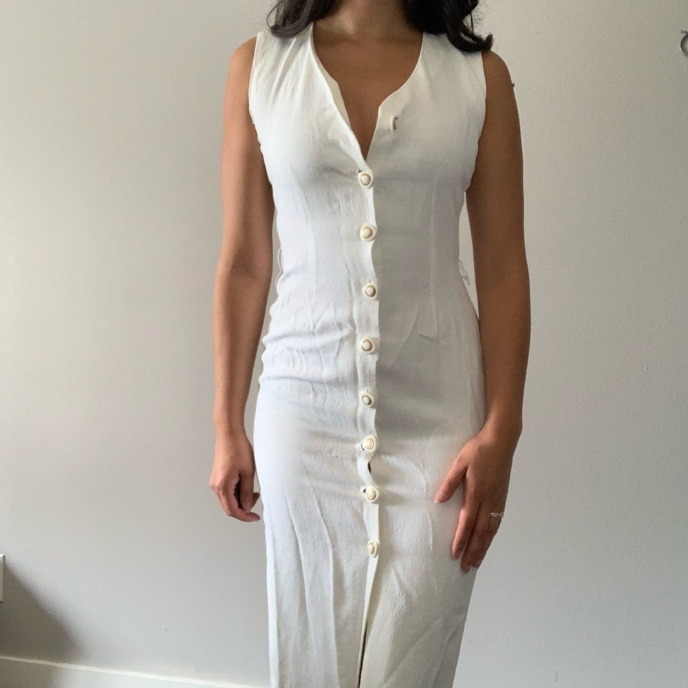 Vintage womanâs long white button up dress with gold accent buttons sleeveless
